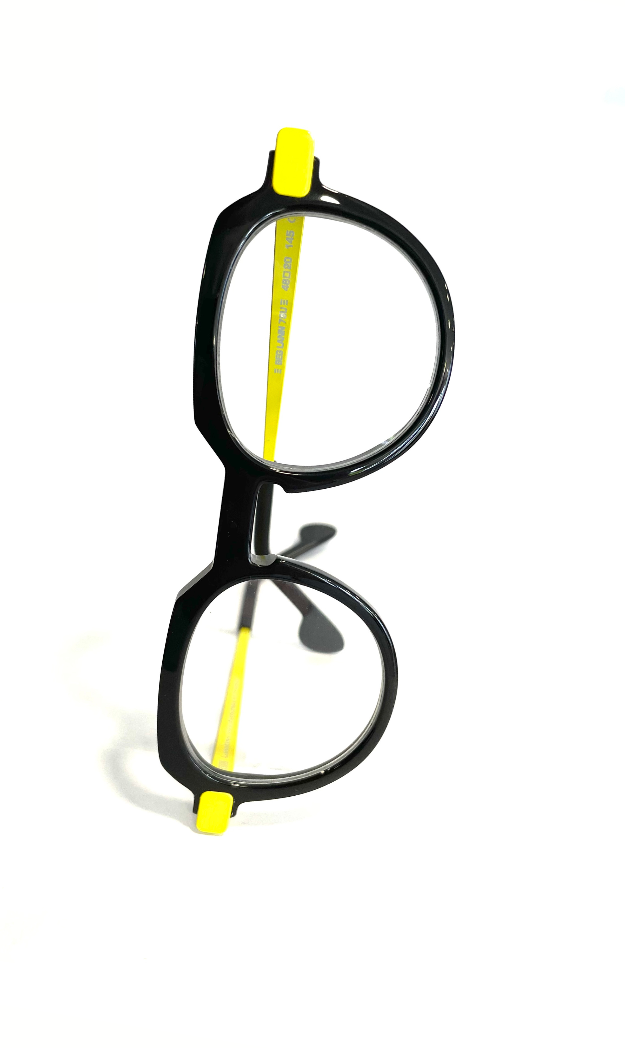 Lunettes Noires à branches en métal jaunes