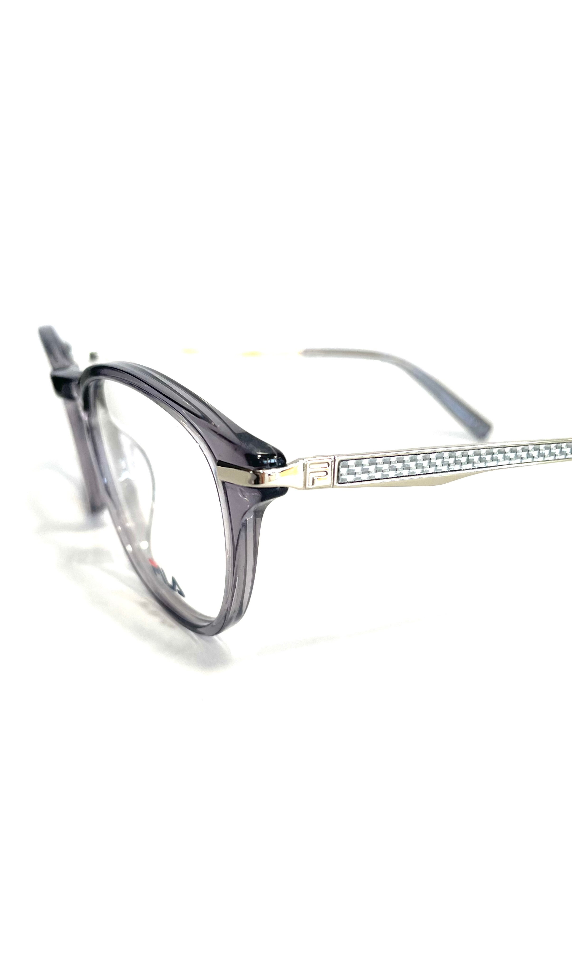 Lunettes Fila à face en acétate transparent et branches en métal