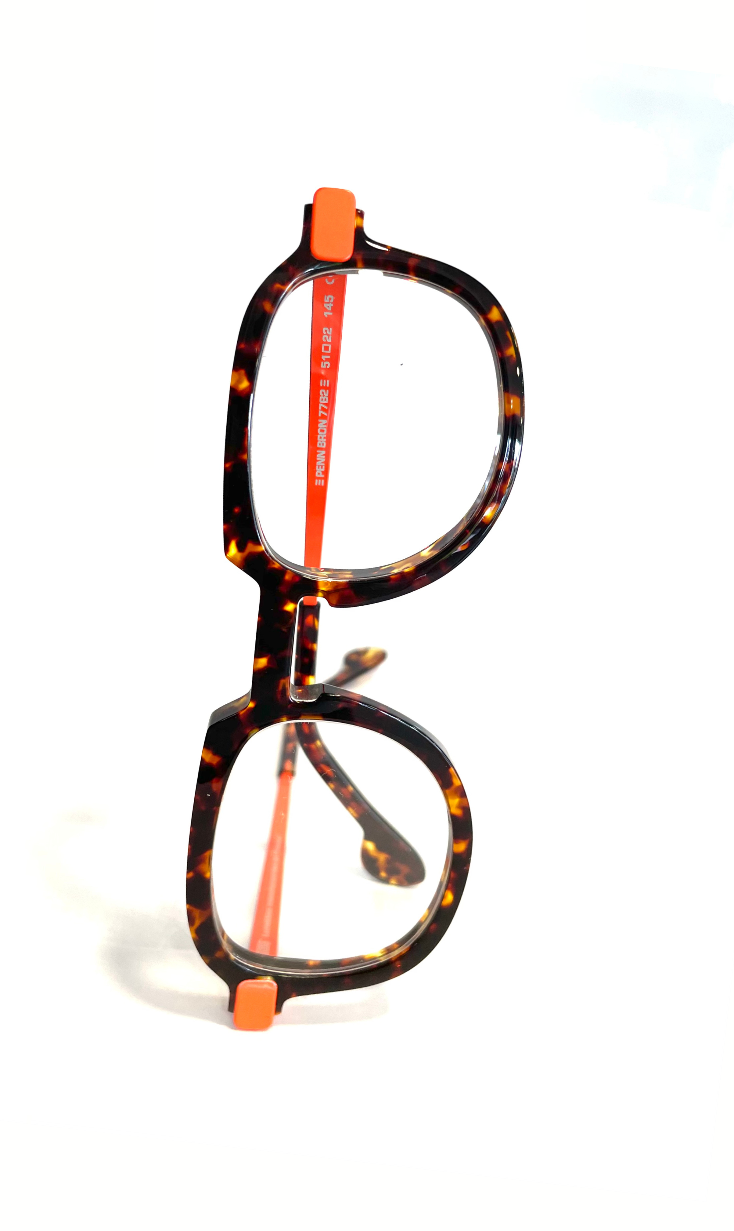 Lunettes écaillées à branches en métal oranges