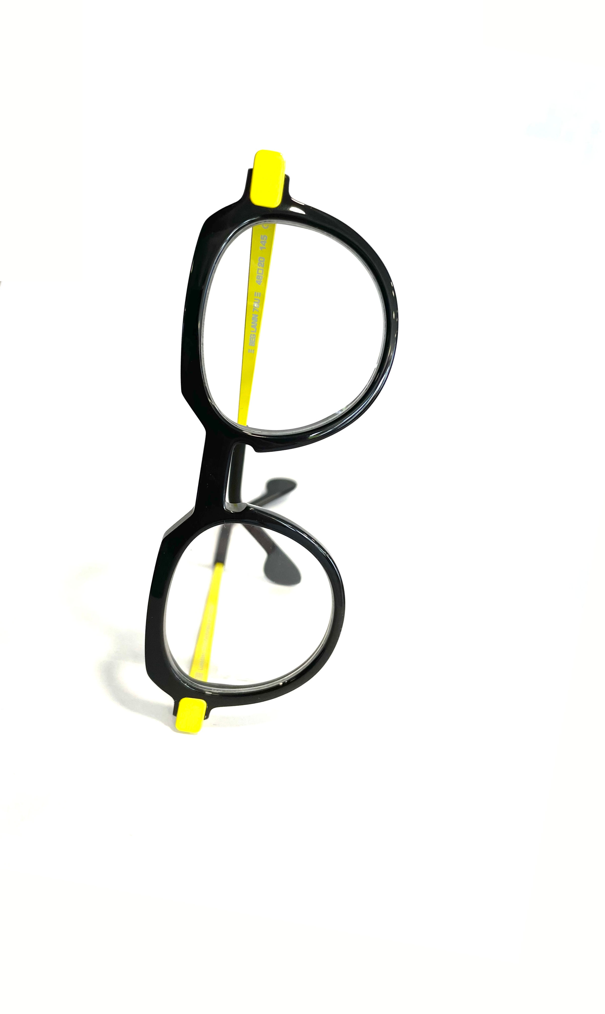 Lunettes Noires à branches en métal jaunes