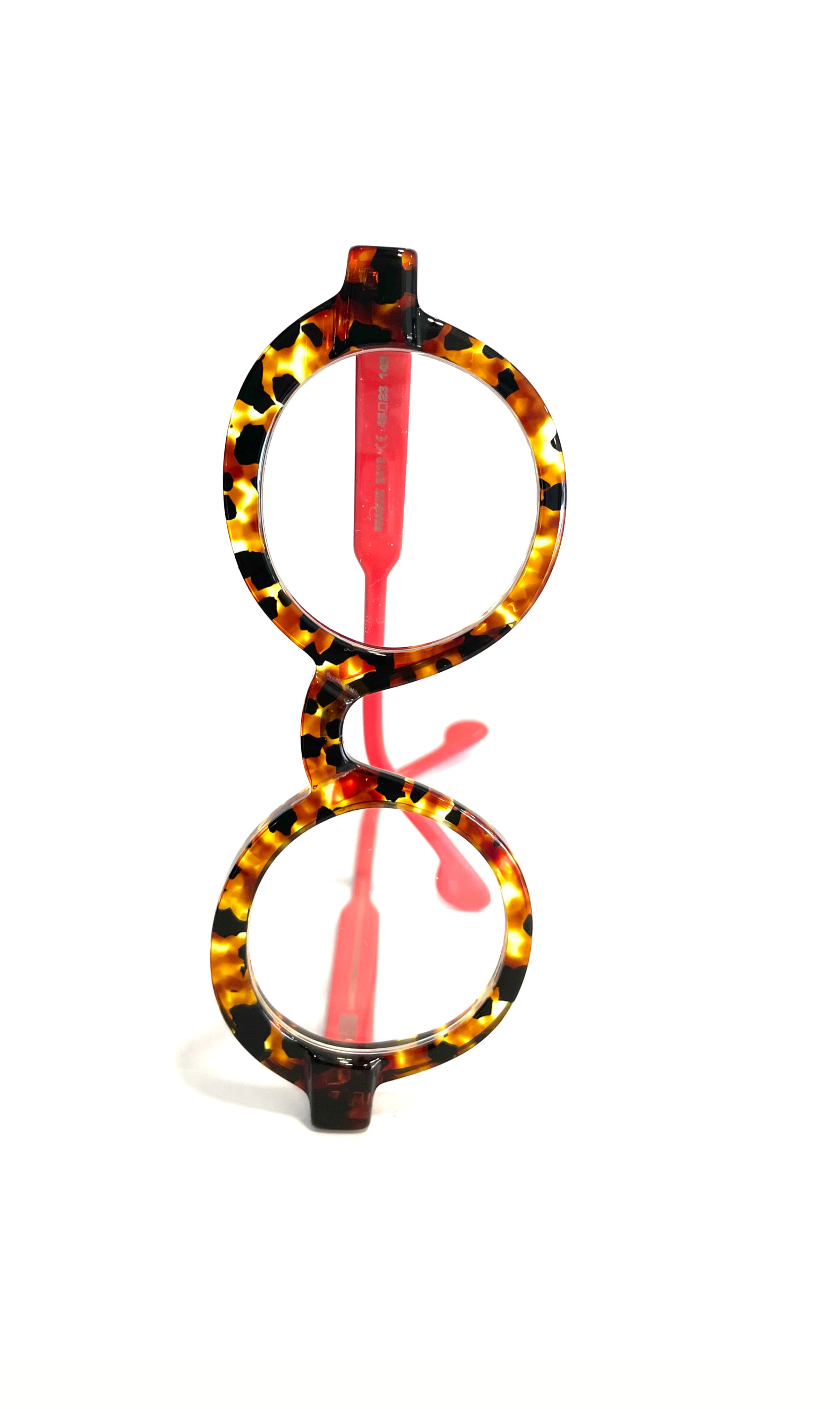 Lunettes rondes écaillées à branches roses