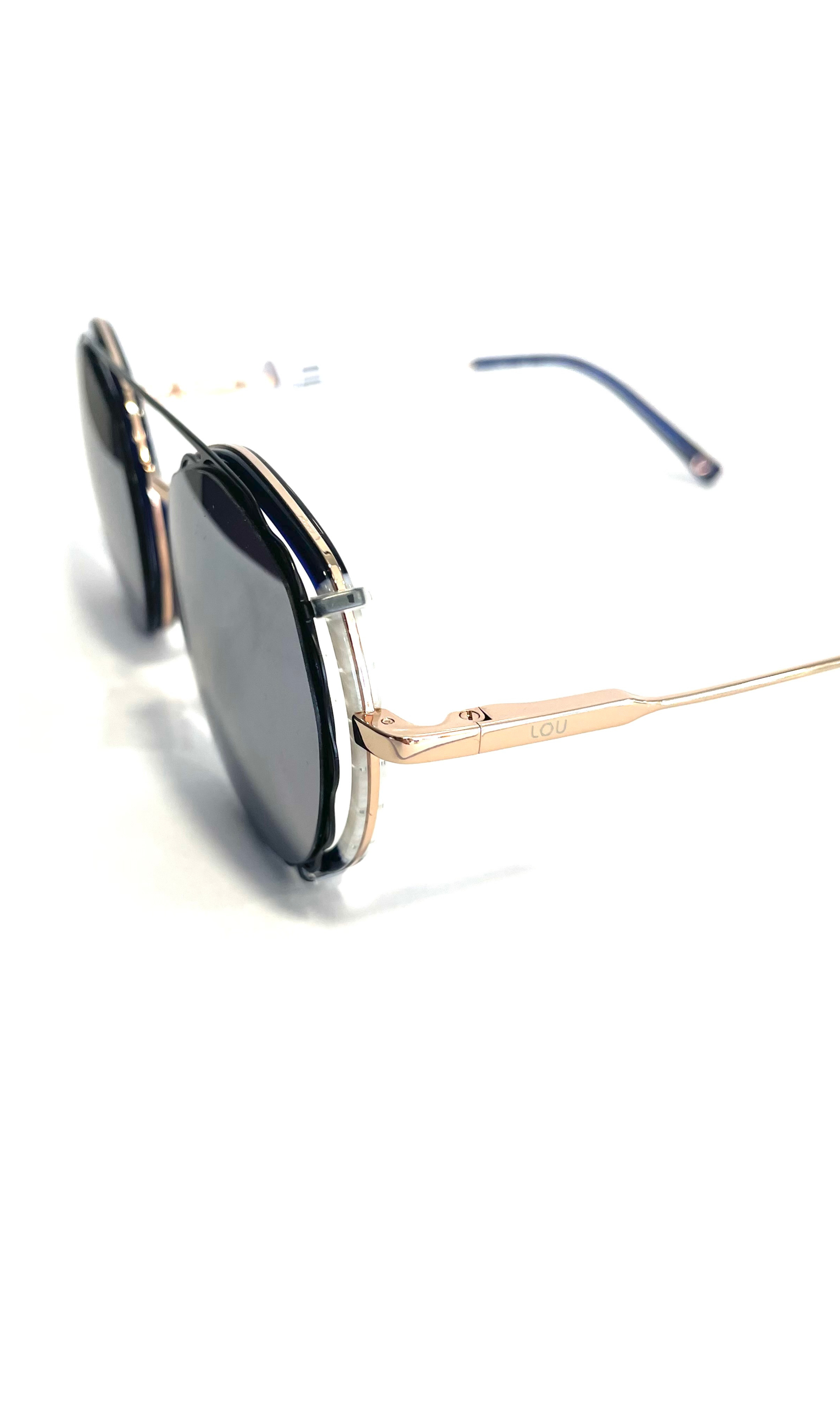 Lunettes à clips solaire Lou à face bleue et en métal rose 